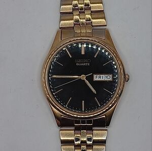 SEIKO 35mm Gold Tone Day/Date Black Dial Quartz Watch  7N43 8A39 Mens